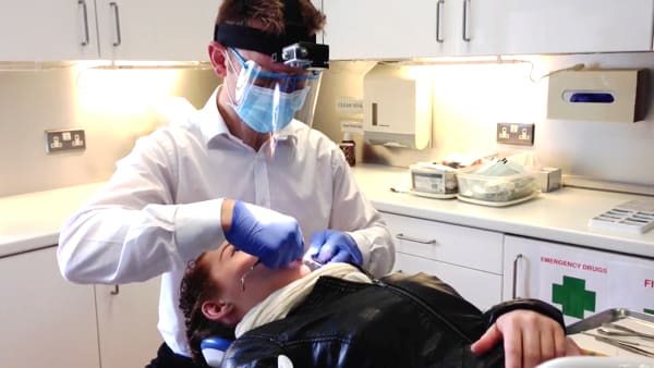 dentist with a gopro camera on his head